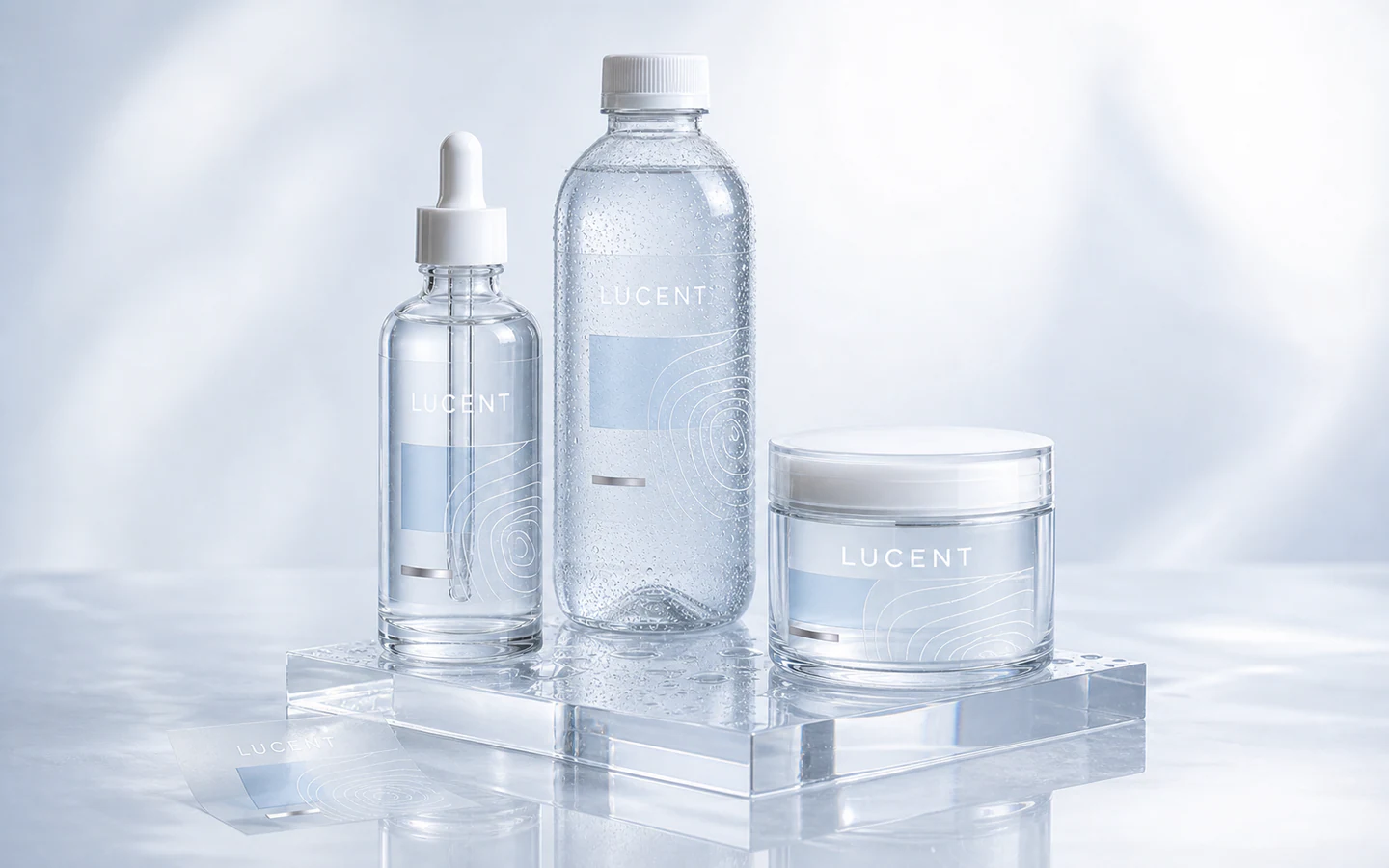 Clear labels applied to chilled beverage, serum, and cosmetic containers