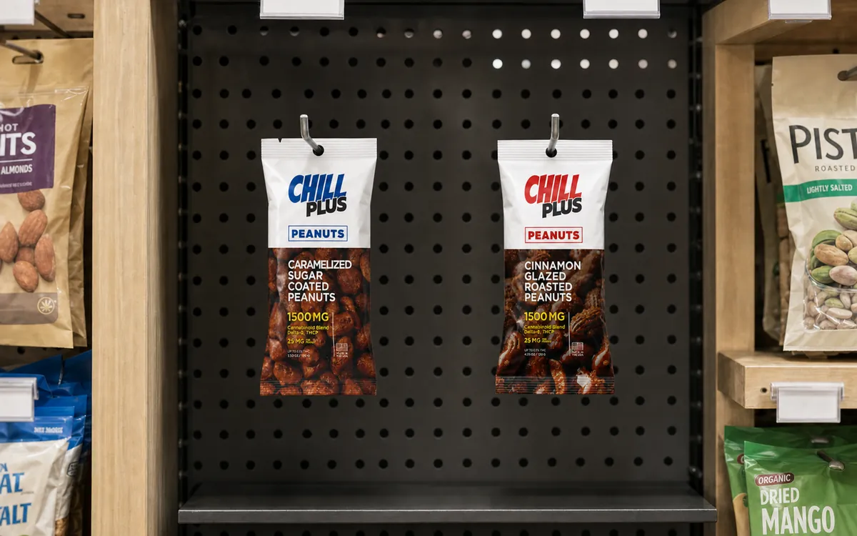 Caramelized and cinnamon peanut fin seal pouches on a retail peg display